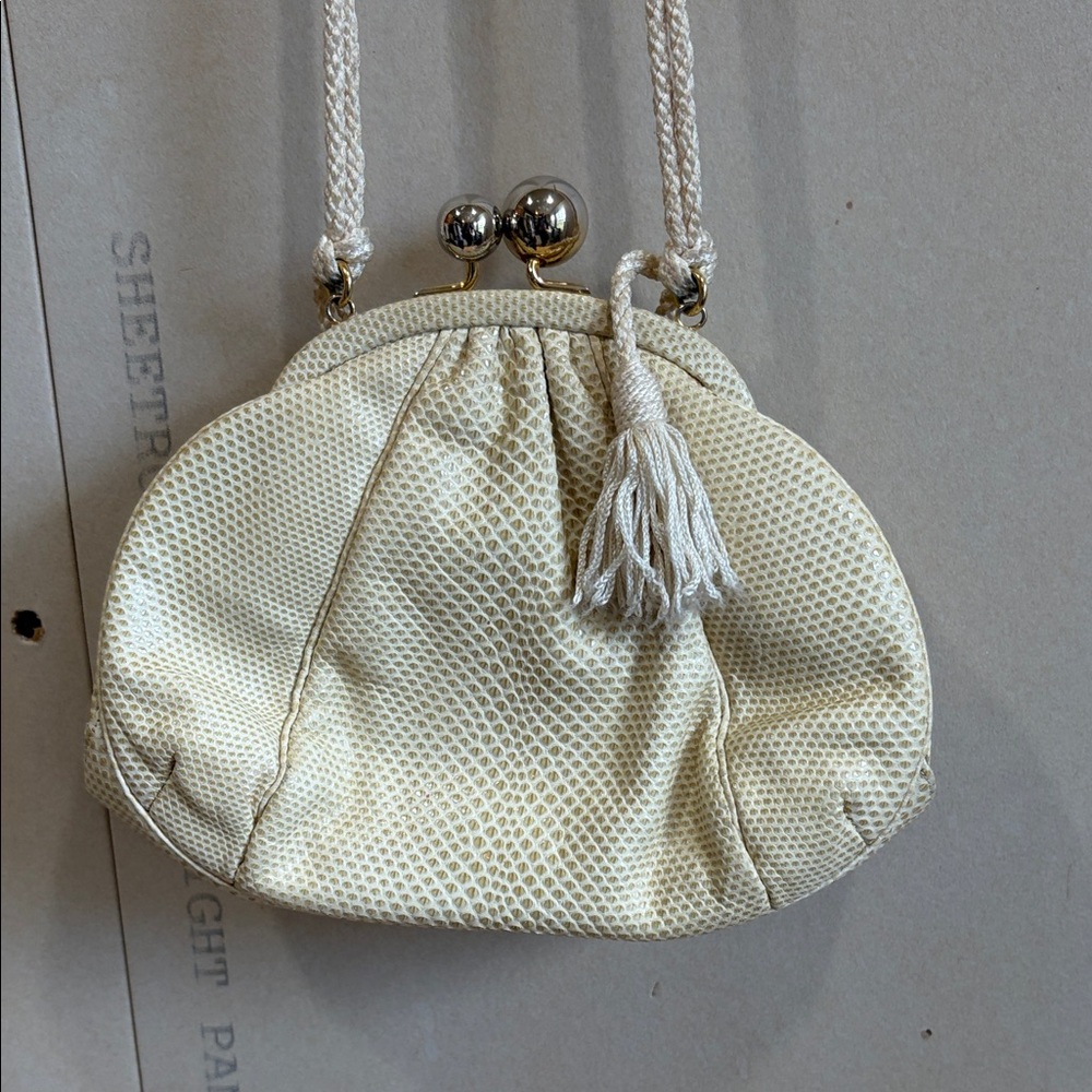 Judith Leiber Cream Textured Kiss-Lock Wristlet with Tassel